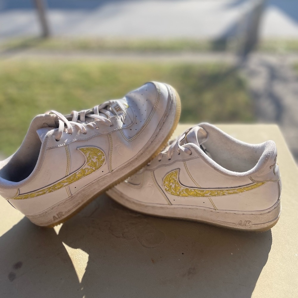 Women’s unique Nikes with Yellow embroidery!